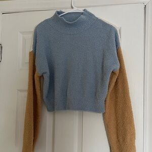 Blue, white, and yellow mock neck sweater